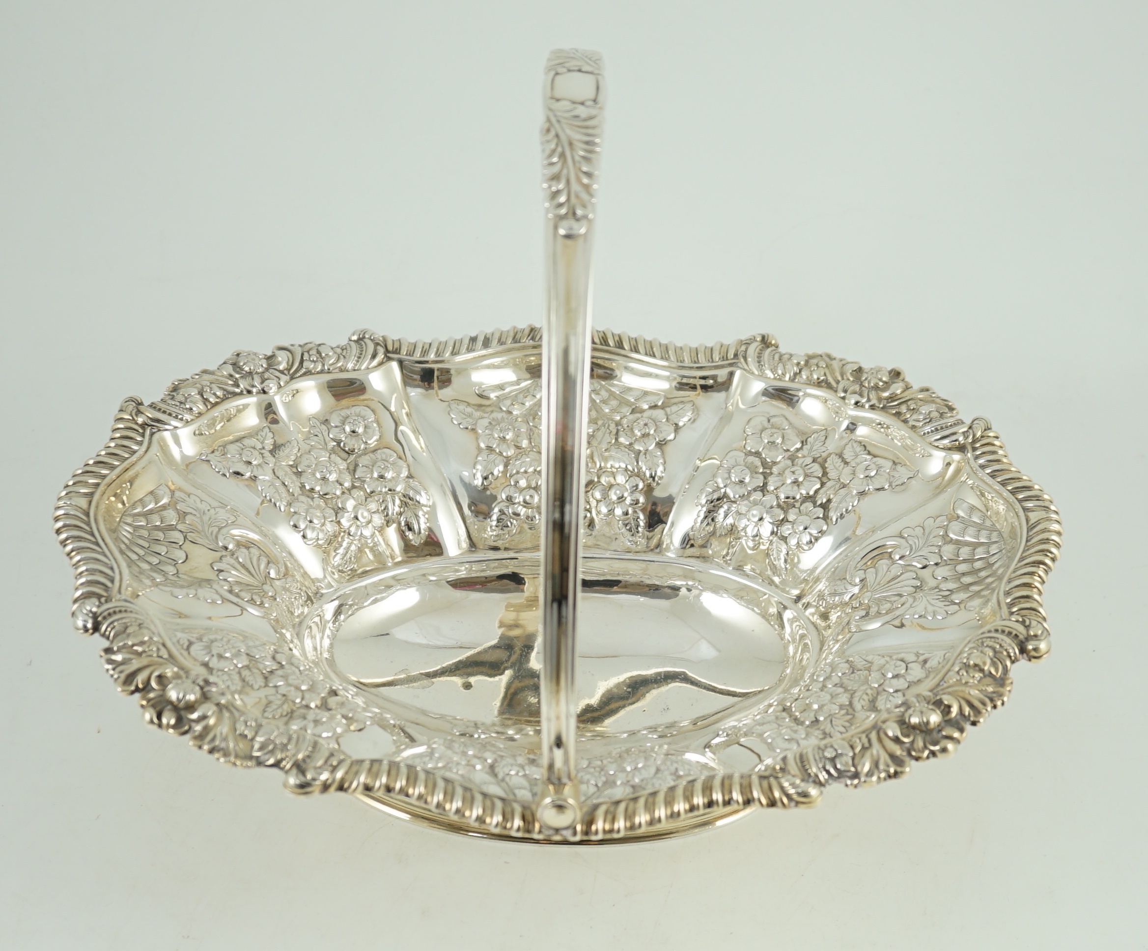 A late George III silver oval cake basket, by Kirby, Waterhouse & Co